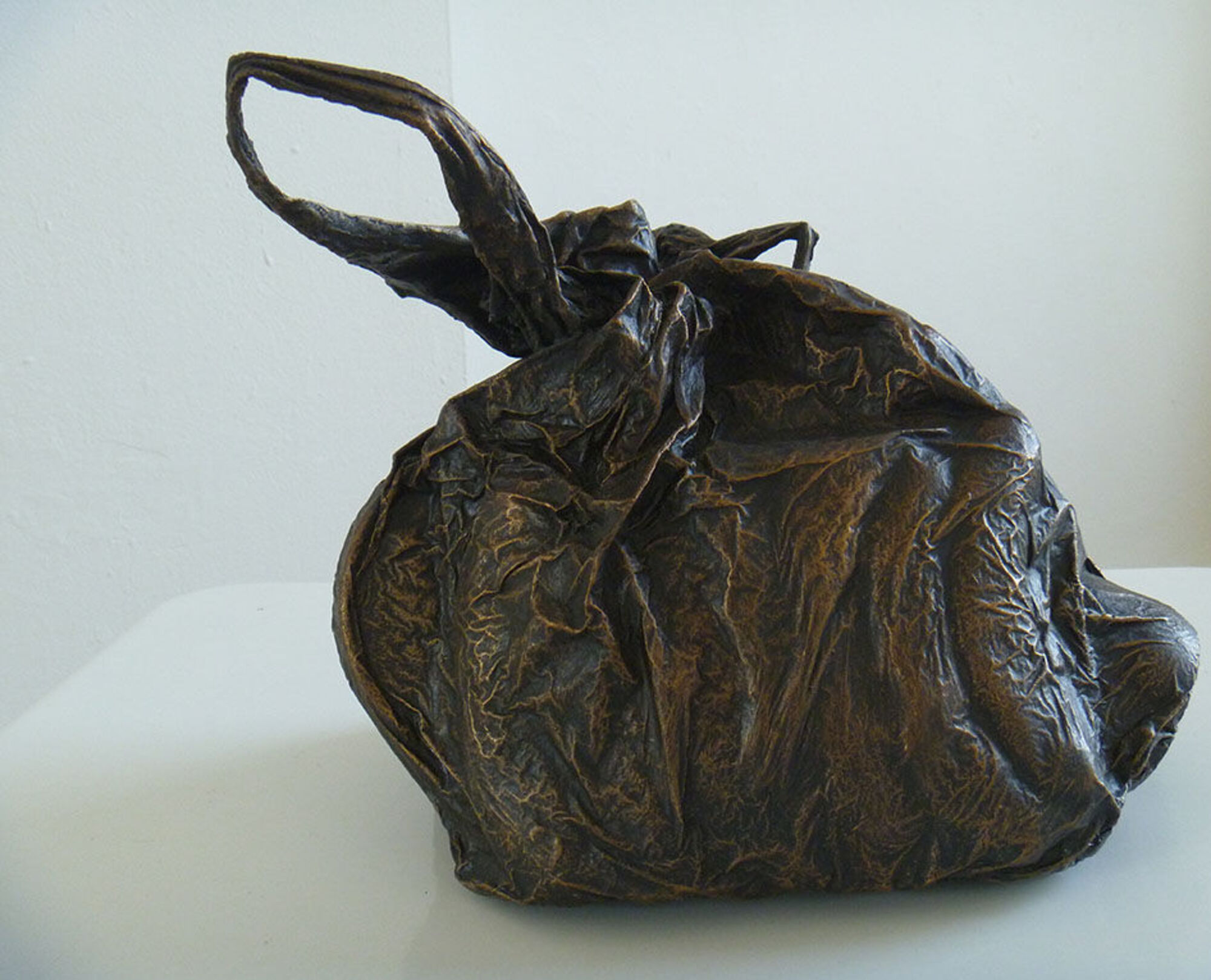 Bronzeguss. Tüte.